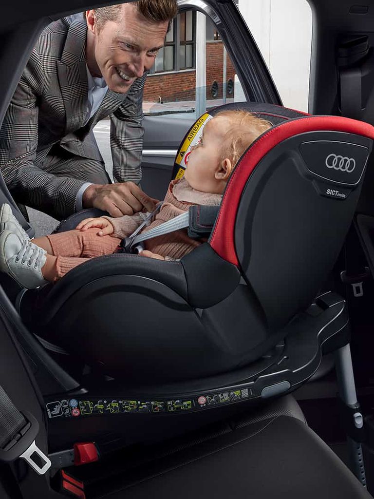 Interior of Audi A3 sedan with baby in child seat